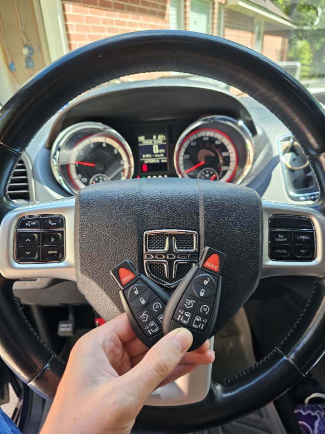 Key fob duplication and programming service were done for the 2017 Dodge Caravan.