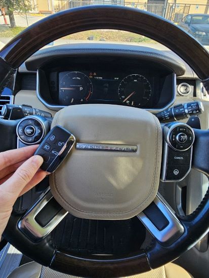 The lost key was replaced with the new smart key for the 2015 Land Rover Range Rover at Meadows Place.