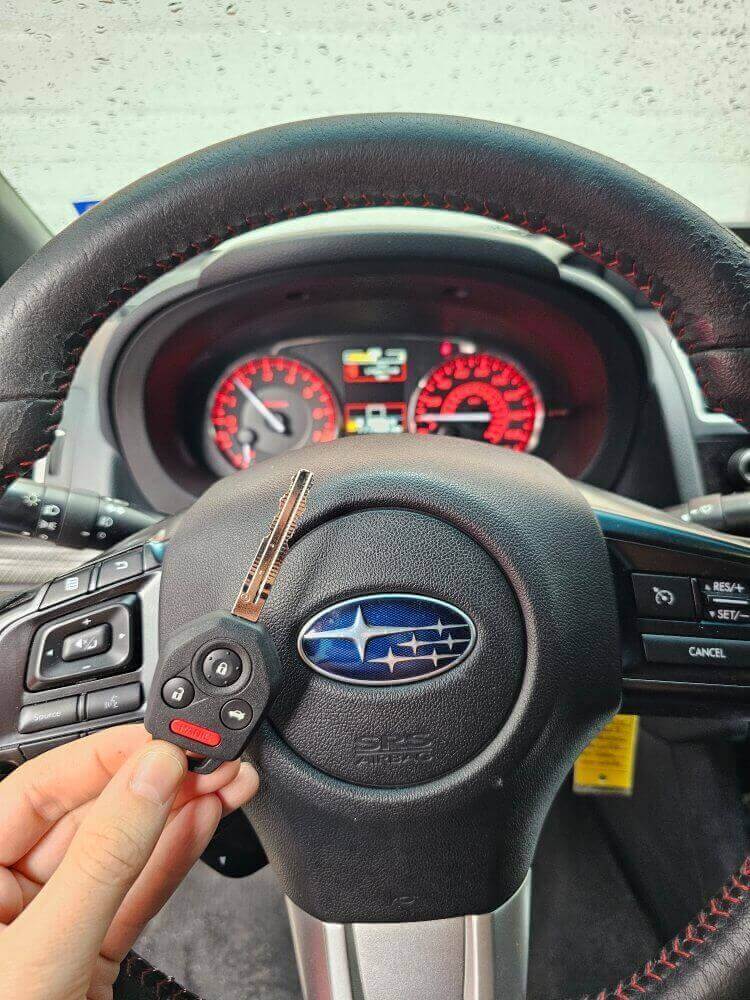 Subaru remote head key replacement service was performed for the 2017 Subaru Impreza WRX in Katy, TX.